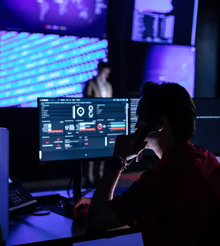 Ford Office Technologies - Man answering the phone at a desk
